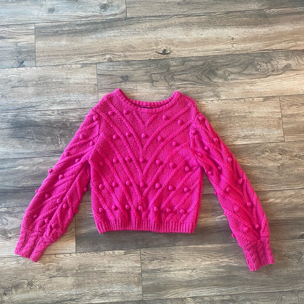 Hot pink sweater with detailing